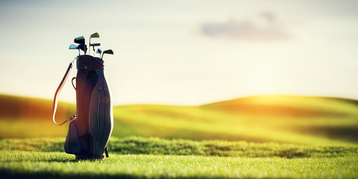 Golf bag with clubs